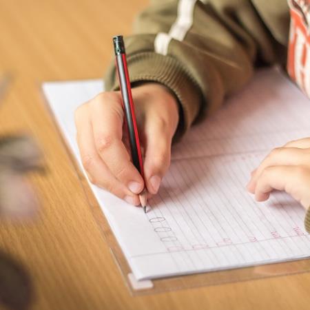 child writing 